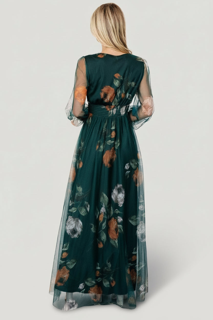 Detail close-up of smocked waist and floral tulle fabric in deep Topaz green with delicate printed florals.