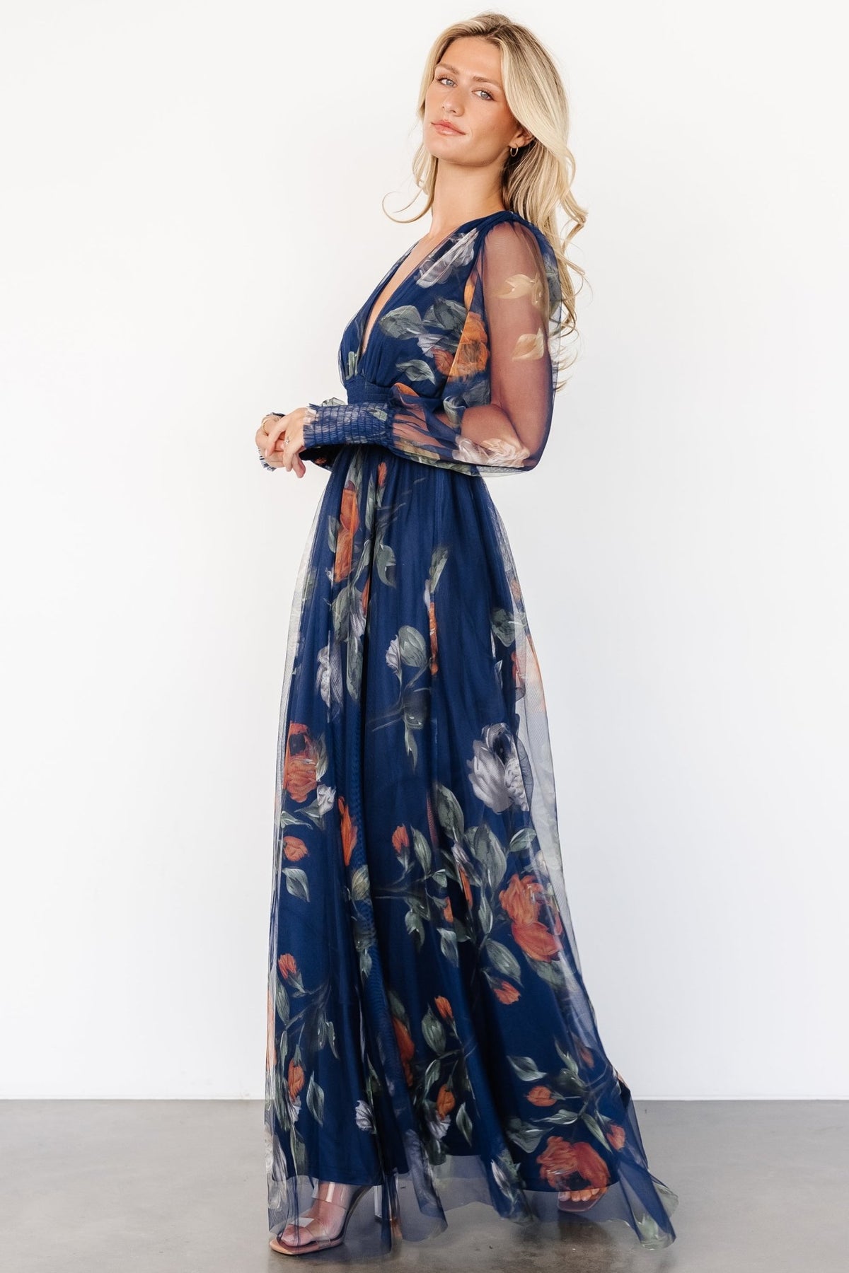 Close-up of bodice and smocked waist on Layla Tulle Maxi Dress, showing fabric texture and V-neck detail.