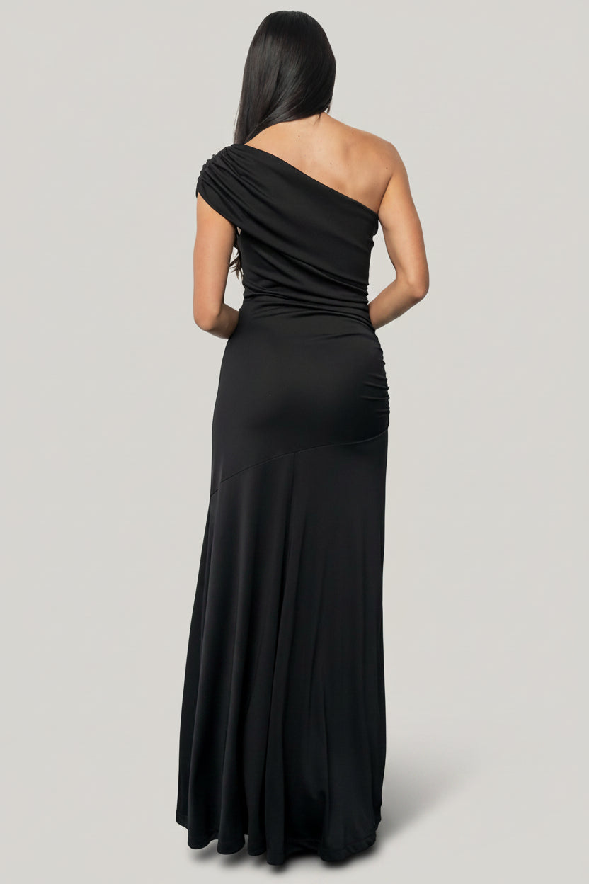 Leon One Shoulder Gown with asymmetrical neckline, diagonal draping, side ruching, and fitted maxi silhouette.