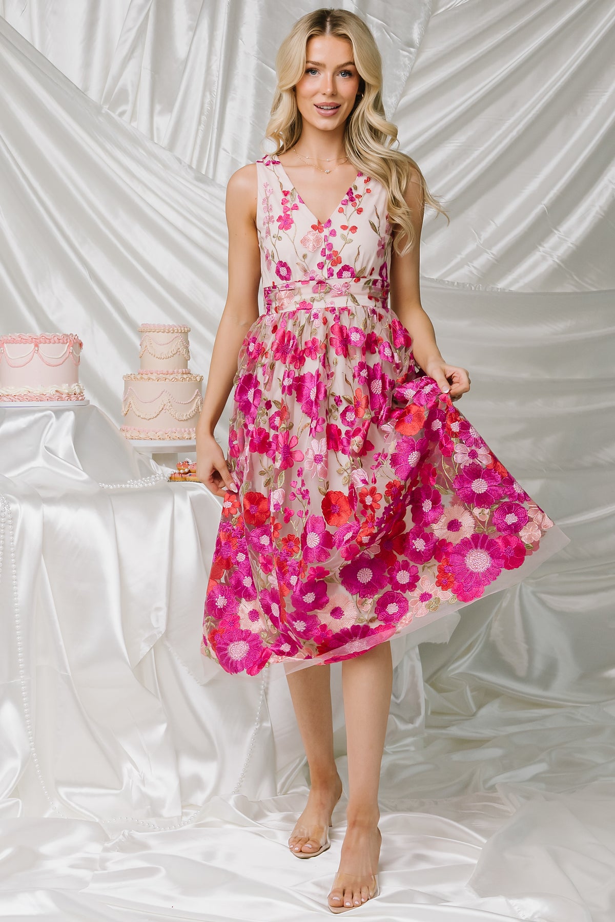 Lila Embroidered Midi Dress in Pink Multi with floral embroidered tulle, V-neckline, pleated bodice, and tiered midi skirt.
