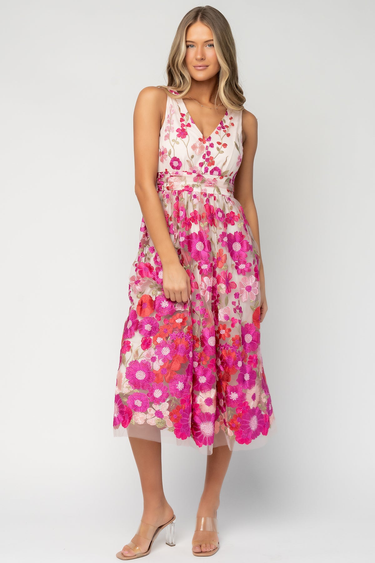 Lila Embroidered Midi Dress in Pink Multi with floral embroidered tulle, V-neckline, pleated bodice, and tiered midi skirt.