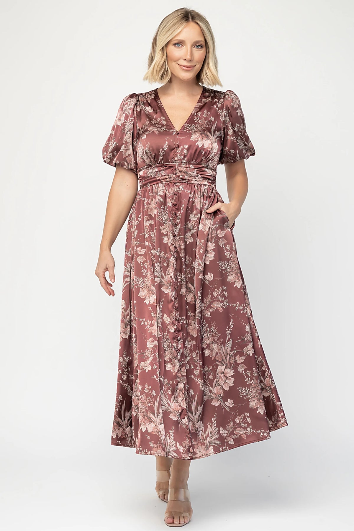 Lilibet Satin Dress in Clove Floral with V-neckline, short sleeves, faux front buttons, gathered waist, and satin finish.