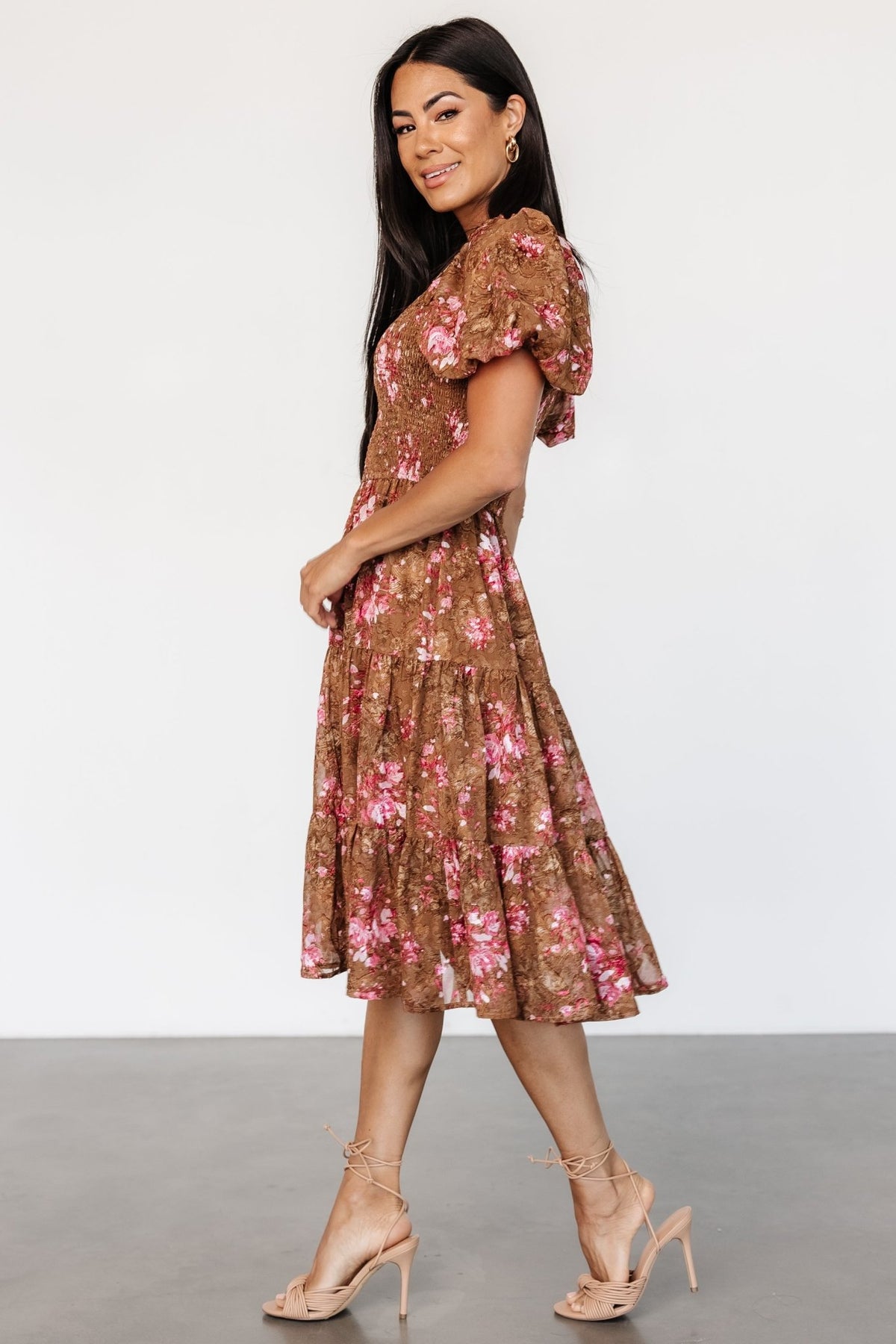 Close-up of embroidered overlay and floral pattern on Lizzy midi dress, highlighting texture and warm copper and rose tones.