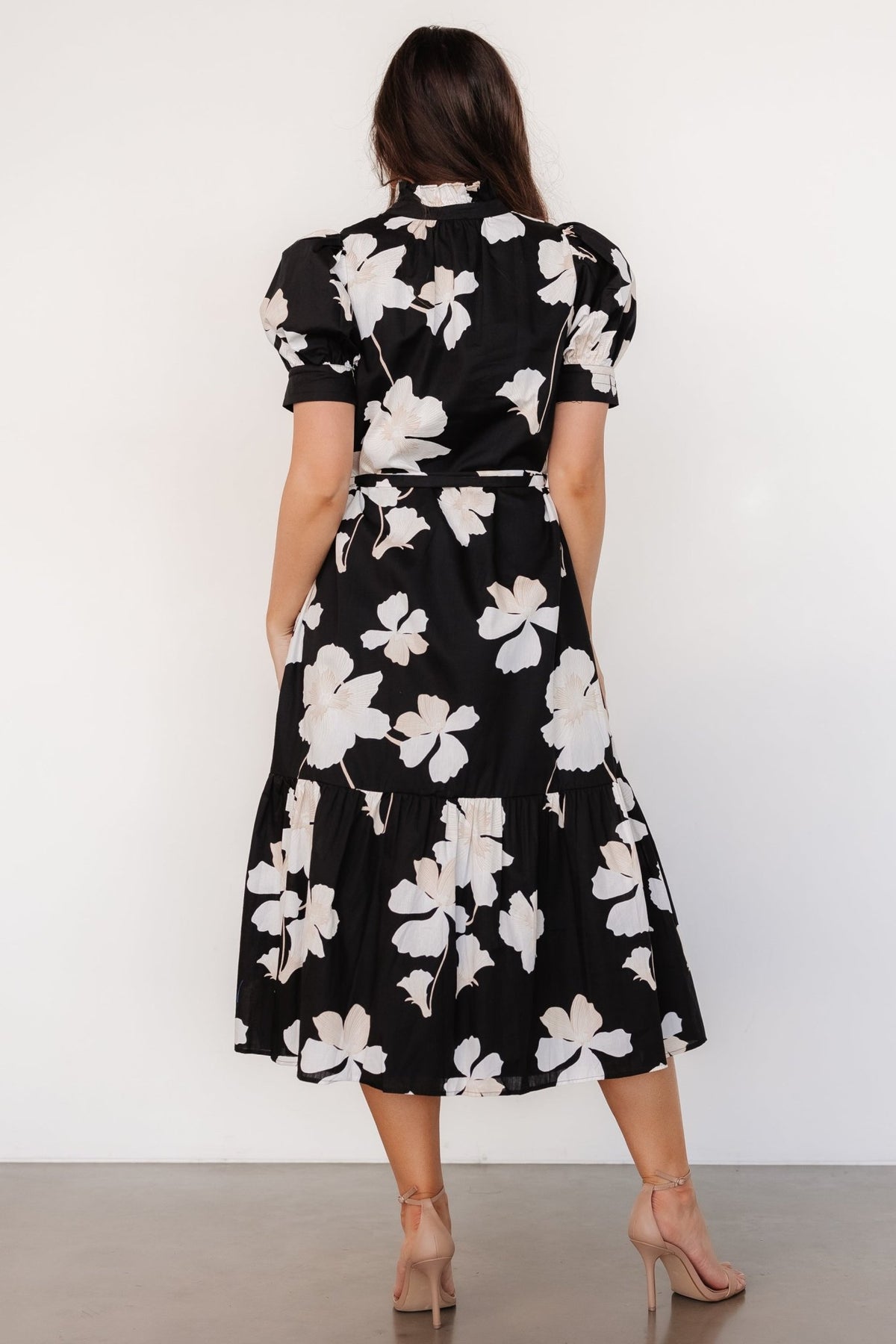 Back and profile view of the midi dress showing the tiered skirt, non-stretch cotton fabric texture, and mid-length hem.