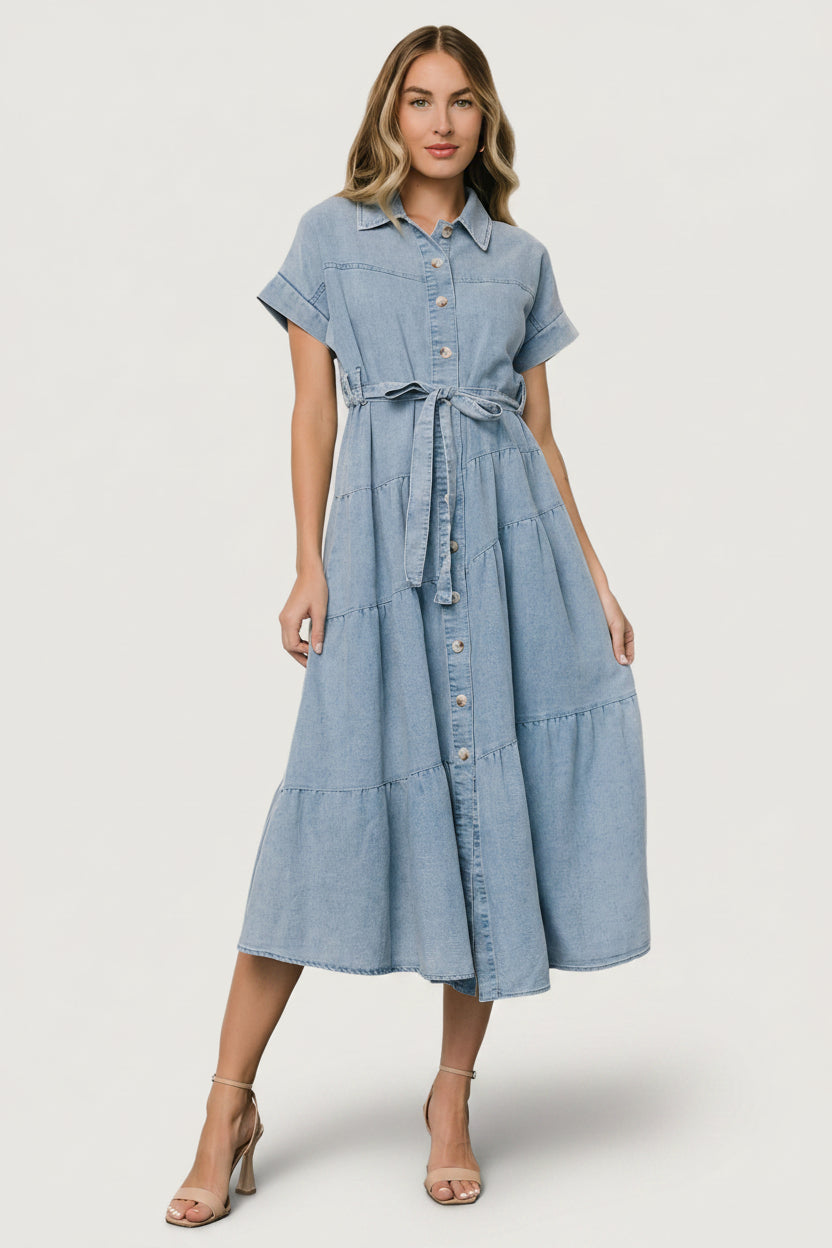 Front view of washed denim button-up midi dress, showing collared neckline, cuffed short sleeves, and removable sash.