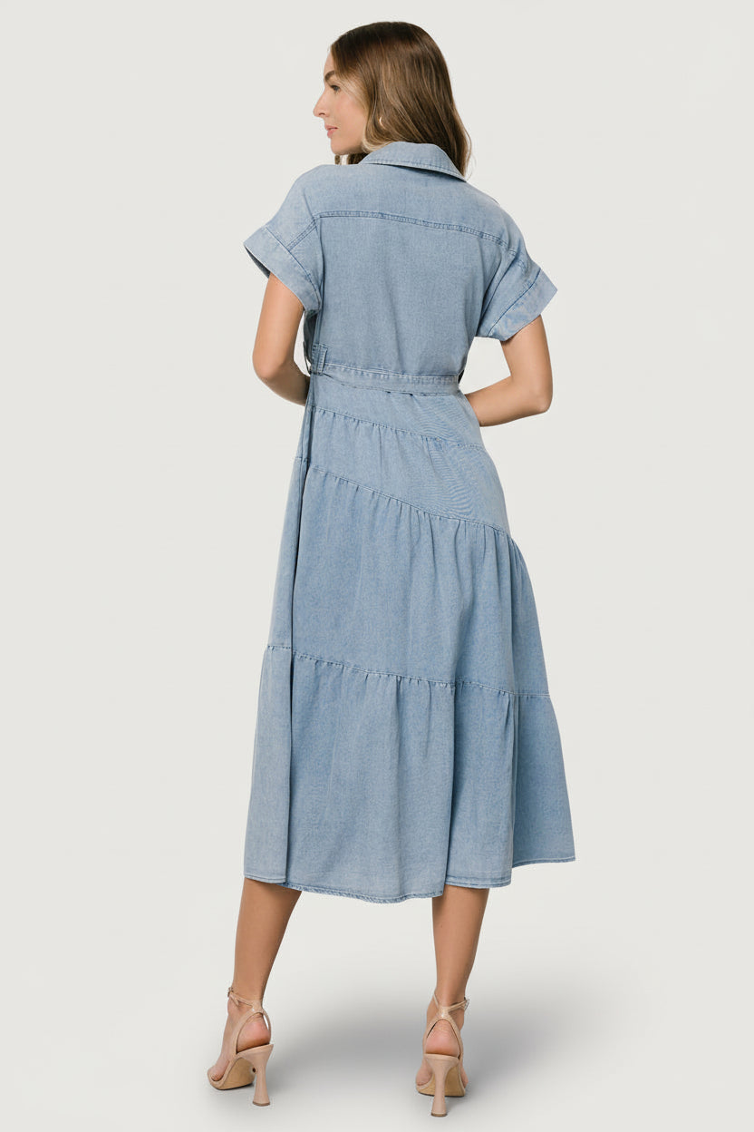 Detail of removable self-tie waist sash and cuffed short sleeve hem to illustrate styling options.