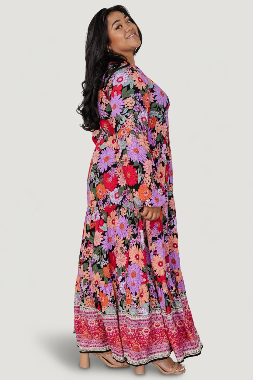 Detail image of Malena Maxi Dress fabric in Black Multi, highlighting the rayon print, color variation and lightweight texture.
