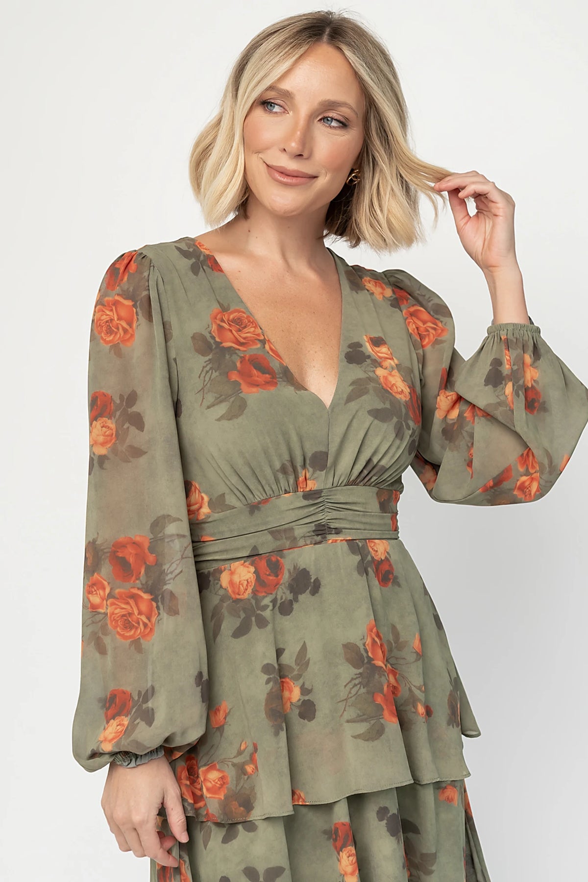 Mariella Tiered Maxi Dress in Dark Sage Floral with V-neckline, long puff sleeves, smocked back, and cascading ruffles.
