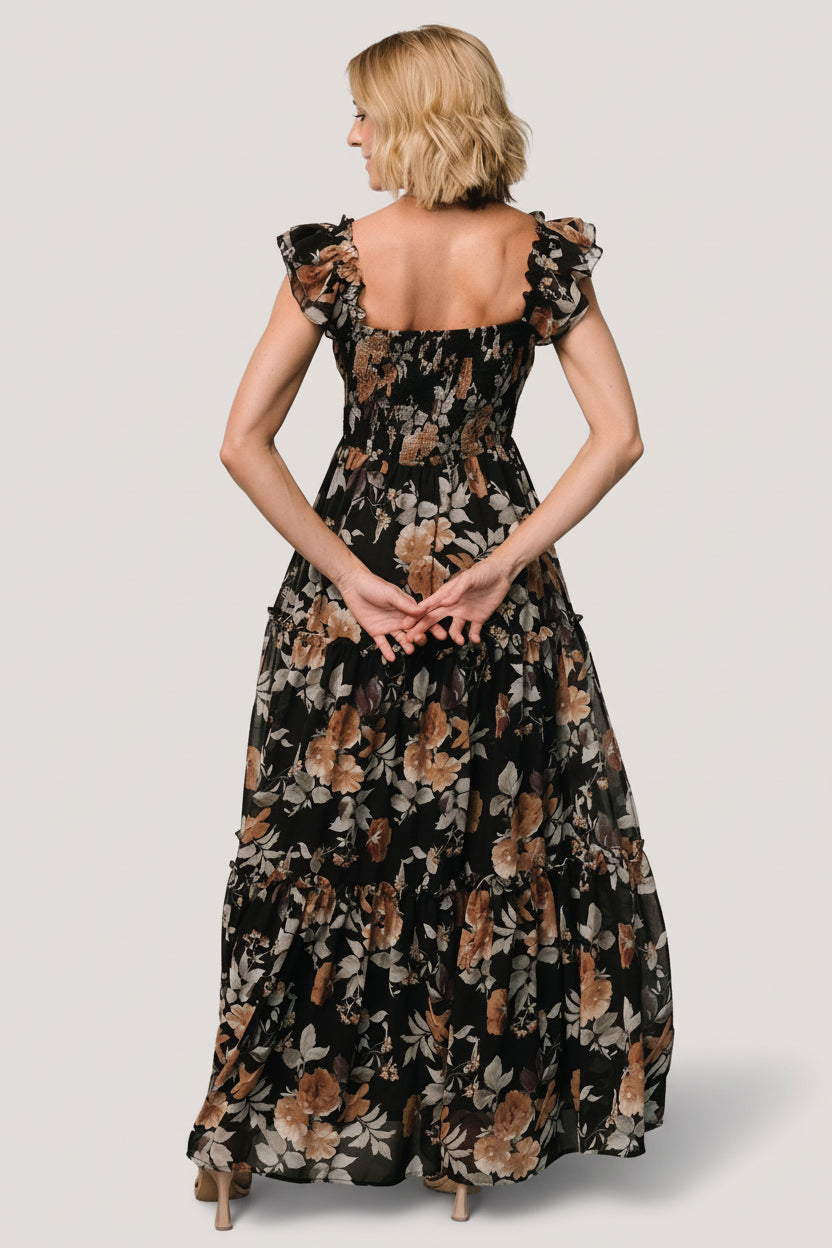 Full-length image of Martina Maxi Dress in Black + Copper Floral on model, showing three-tiered maxi skirt and overall silhouette.