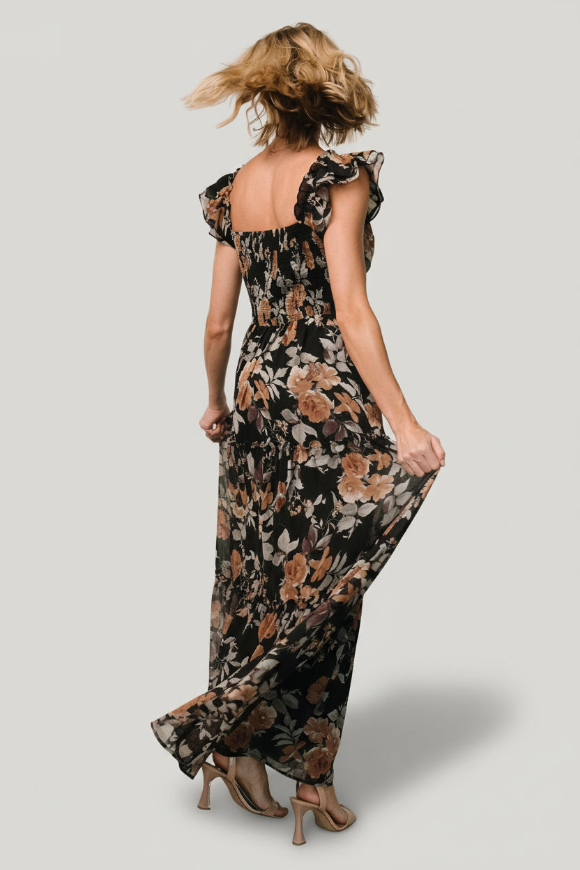 Detail view of double-layered flutter sleeve and delicate ruffle at the elastic shoulder of the Martina Maxi Dress.