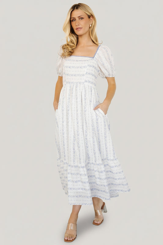 Front view of Martine Puff Sleeve Midi Dress in ivory multi floral showing square neckline, scalloped trim, puff sleeves, and single-tiered midi skirt.