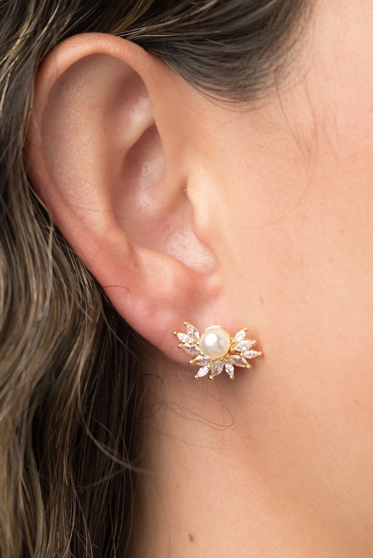 Maryana Pearl Statement Stud Earrings in Gold with marquise-cut cubic zirconia and faux pearl center.