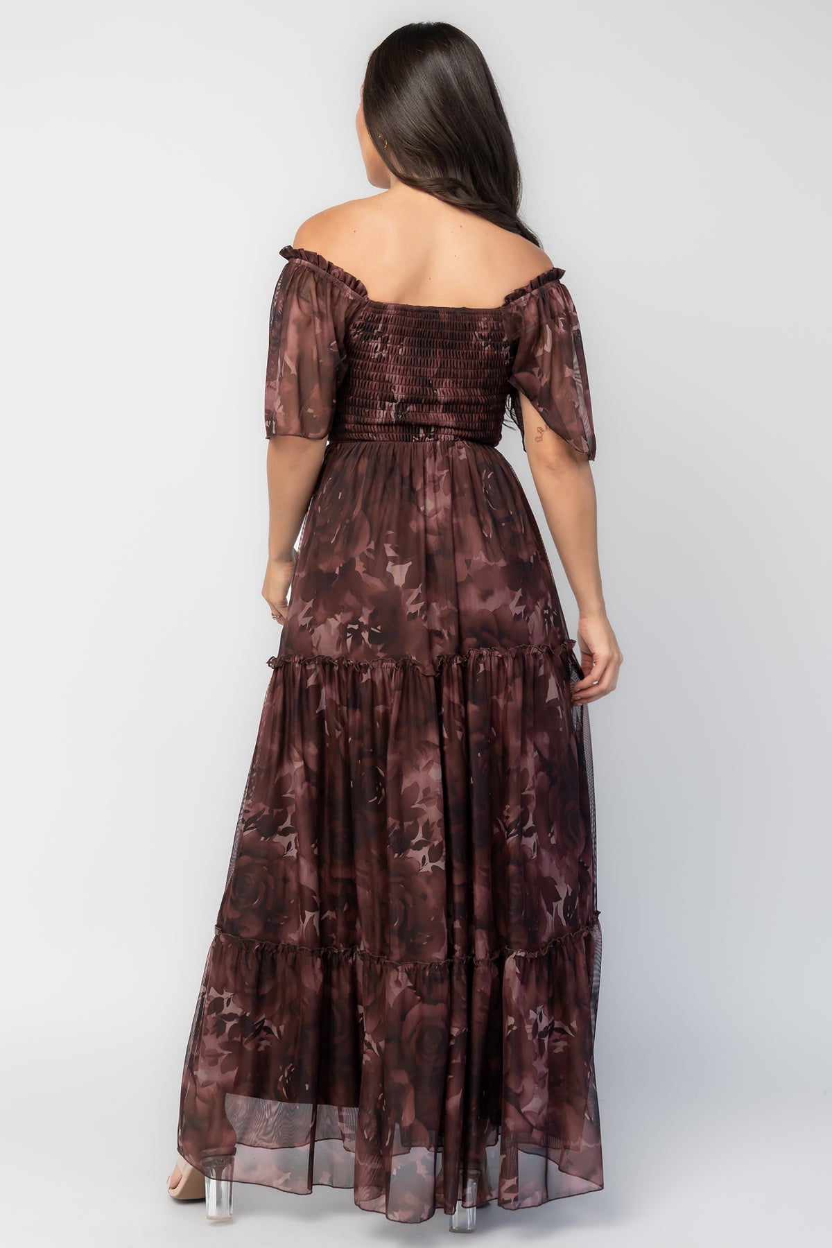 Meya Mesh Maxi Dress in Dark Mahogany Print with abstract florals, smocked bodice, flutter sleeves, and tiered skirt.