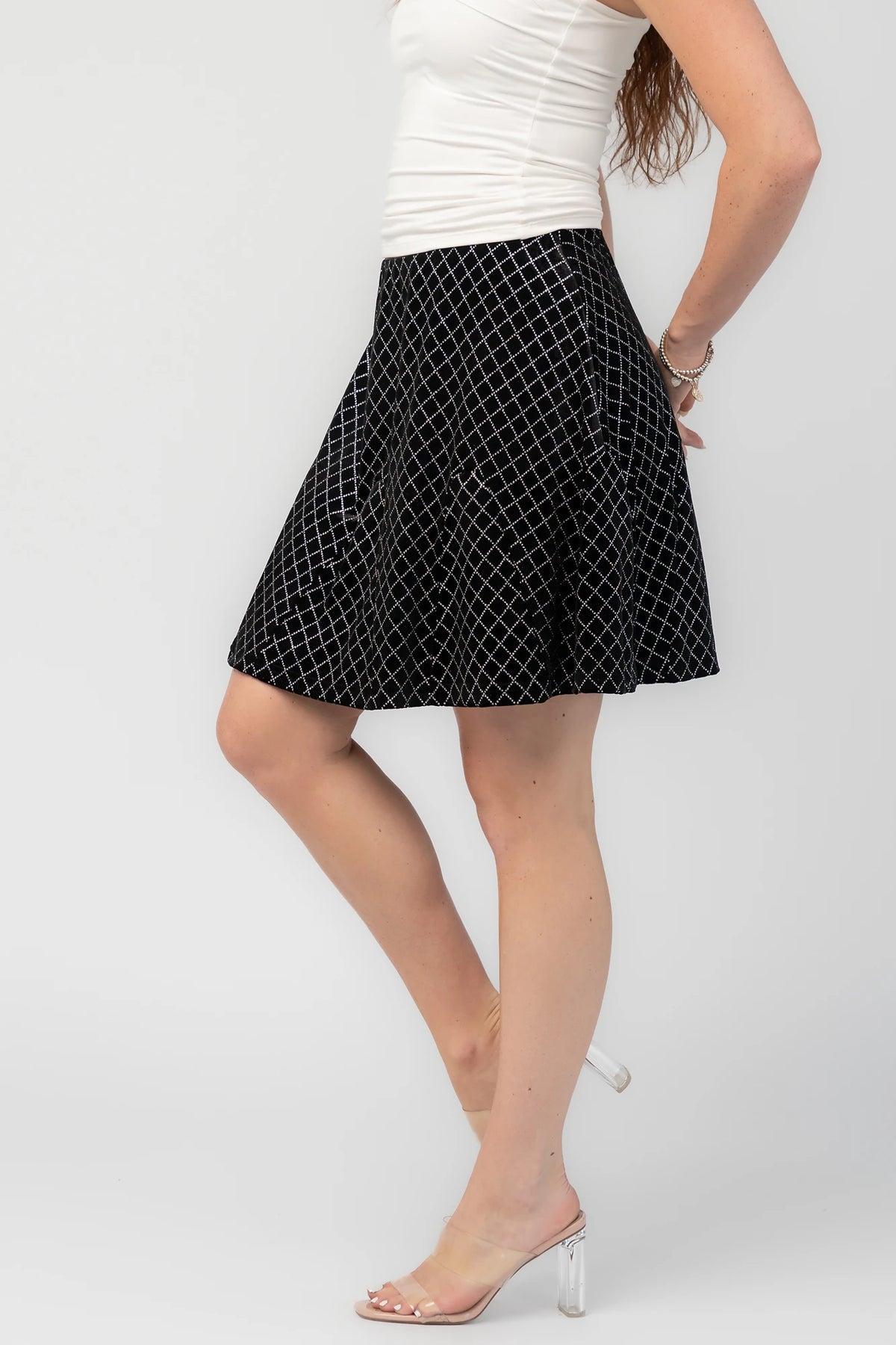 Michelle Flare Skirt in Black with rhinestone embellishments, elastic waistband, and flared silhouette.