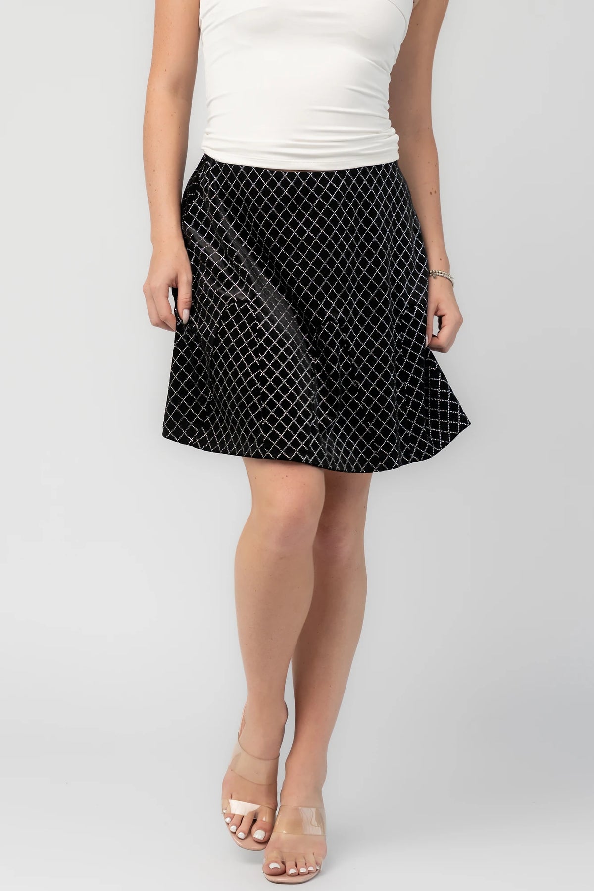 Michelle Flare Skirt in Black with rhinestone embellishments, elastic waistband, and flared silhouette.