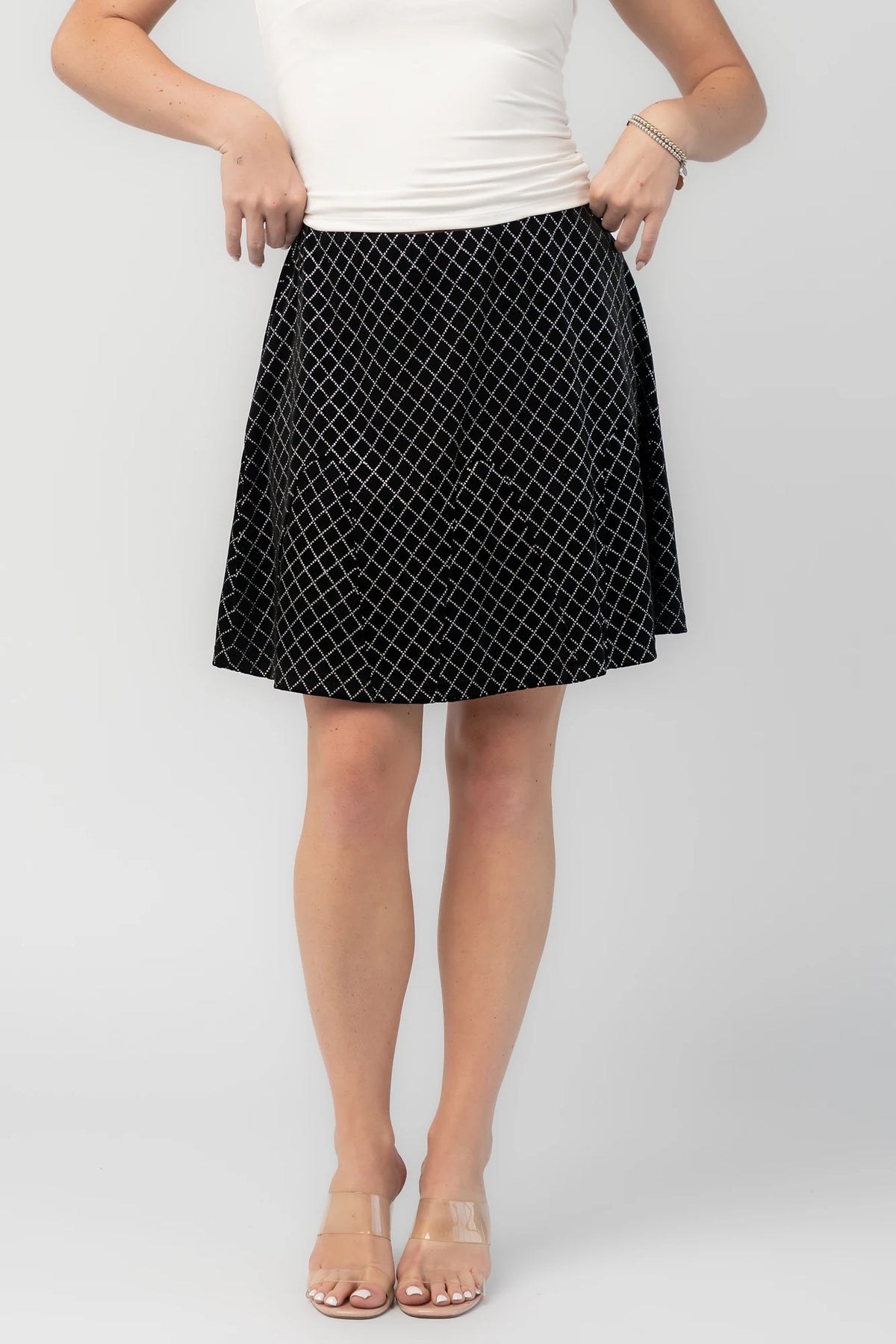 Michelle Flare Skirt in Black with rhinestone embellishments, elastic waistband, and flared silhouette.