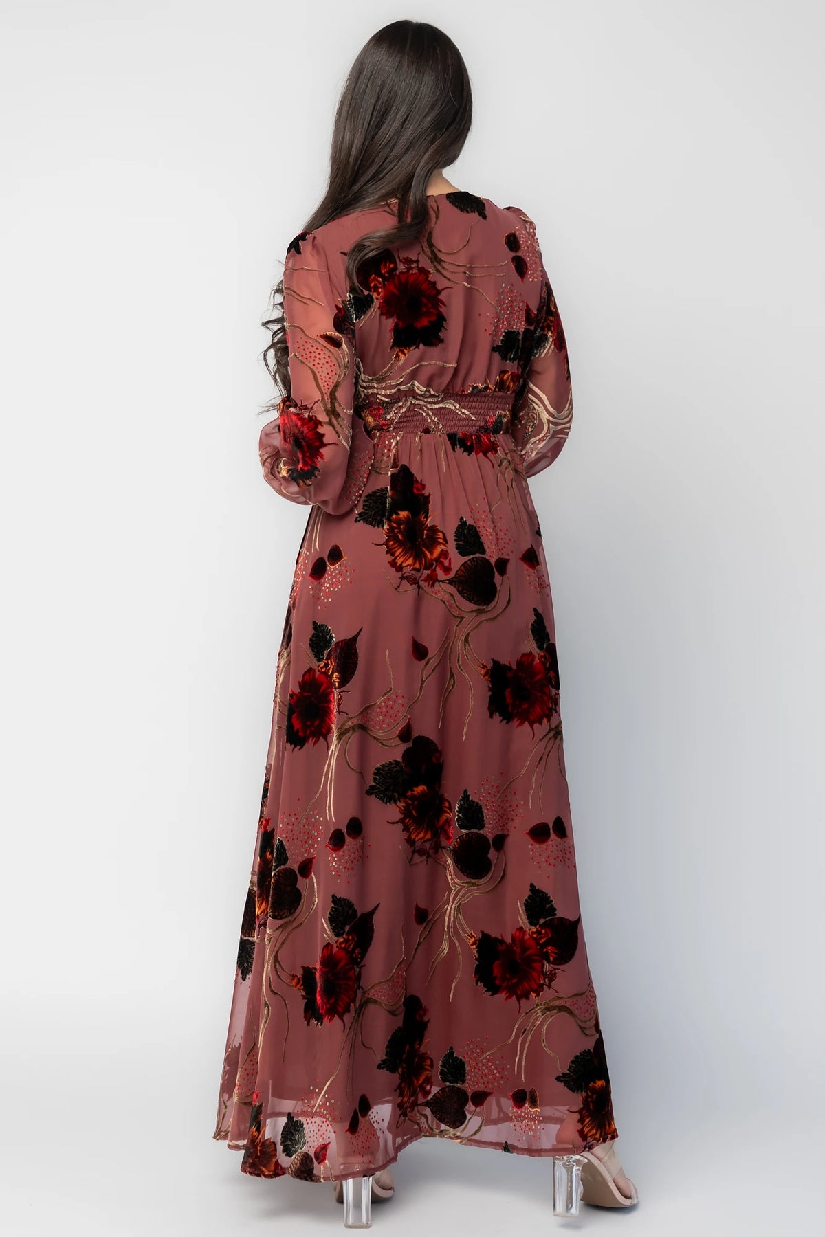 Mikla Maxi Dress in Berry Multi with burnout velvet print, deep V-neckline, long sleeves, smocked waist, and asymmetrical hem.