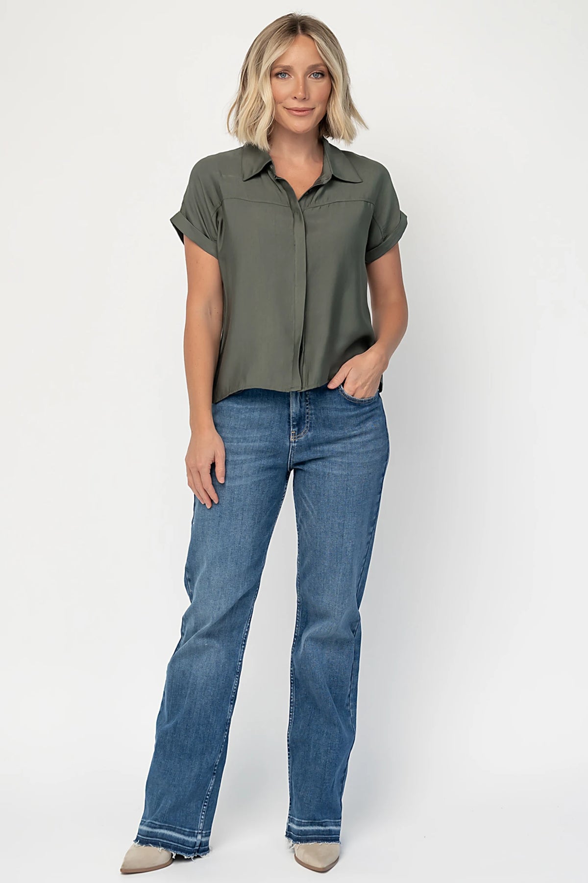 Miriam Top in Dark Sage with collared neckline, concealed button front, cuffed short sleeves, and relaxed silhouette.