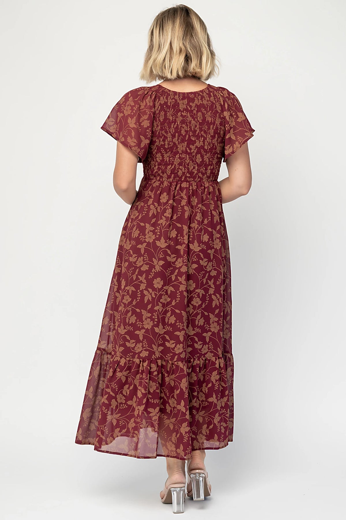 Monica Smocked Dress in Wine + Gold with V-neckline, smocked bodice, flutter sleeves, high waist, and tiered skirt.