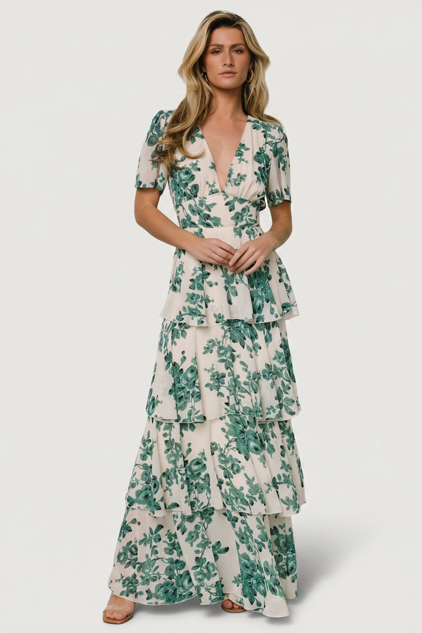 Detail of V-neckline and short flowy sleeve, showing seam finish and lightweight chiffon layering over lining.