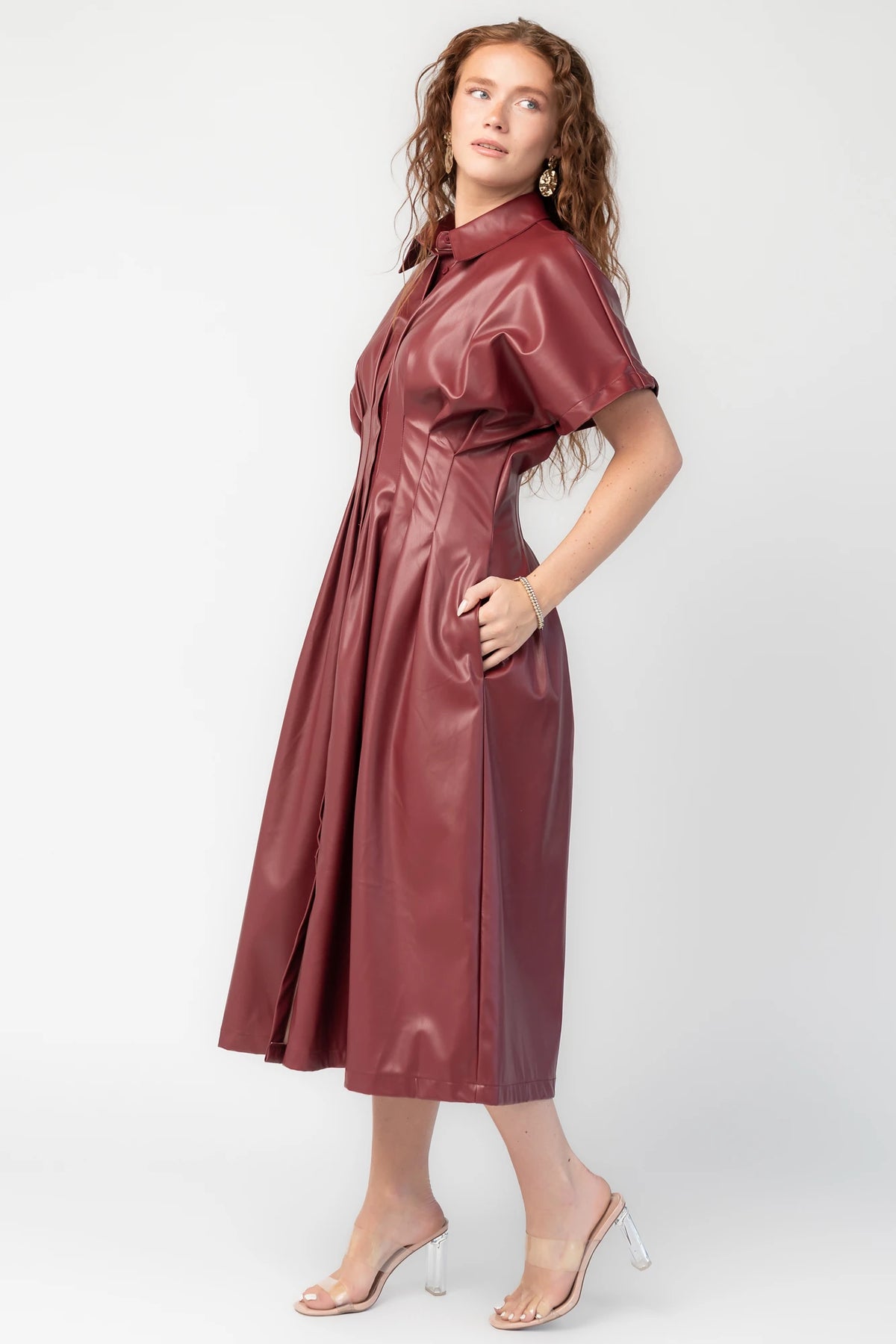 Montclair Structured Midi Shirt Dress in Burgundy with faux leather, button front, pleated waist, and full skirt.