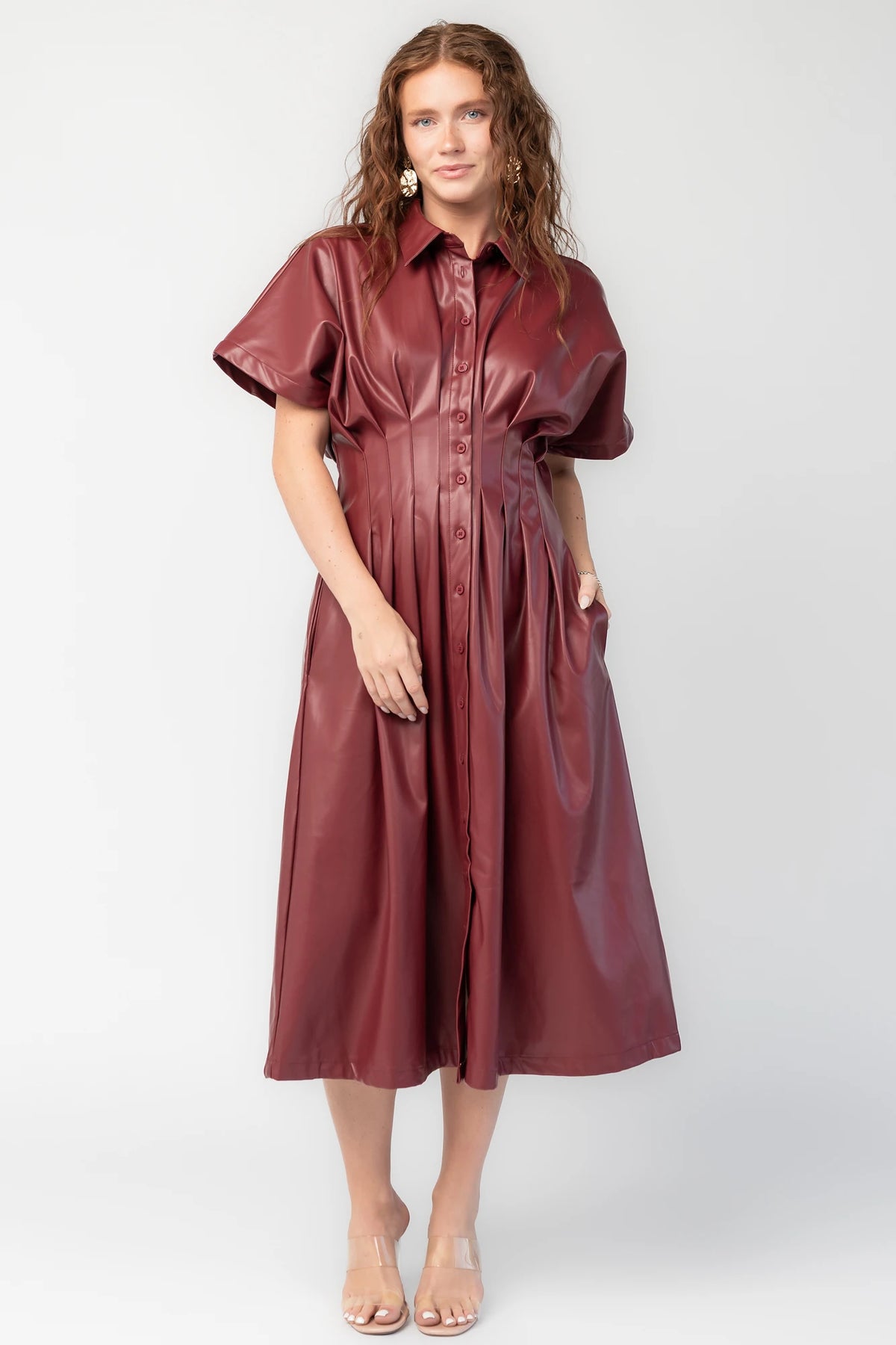 Montclair Structured Midi Shirt Dress in Burgundy with faux leather, button front, pleated waist, and full skirt.