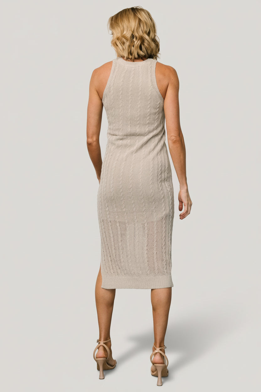 Back view of the Nalani Knit Tank Dress in Stone showing the clean back finish and midi length suitable for day-to-night wear.