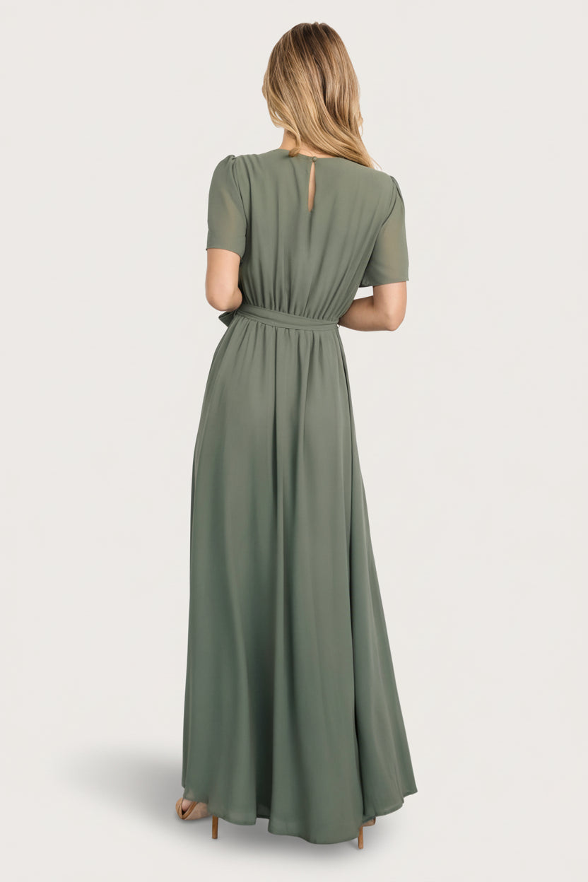 Close-up of chiffon fabric and removable belt tie on the Naomi dark sage maxi dress, illustrating texture and lining at the bodice.