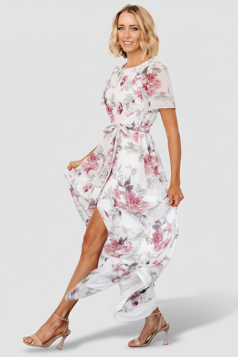 Styled view of Naomi dress with removable self-tie belt at the natural waist, illustrating waist definition and maxi length.