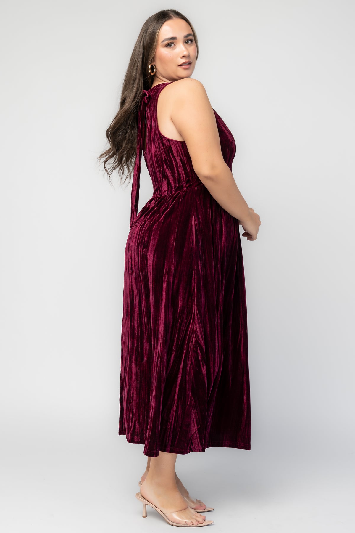Octavia Velvet Midi Dress in Cranberry with crinkled velvet texture, square neckline, V-waistline, and flared midi skirt.