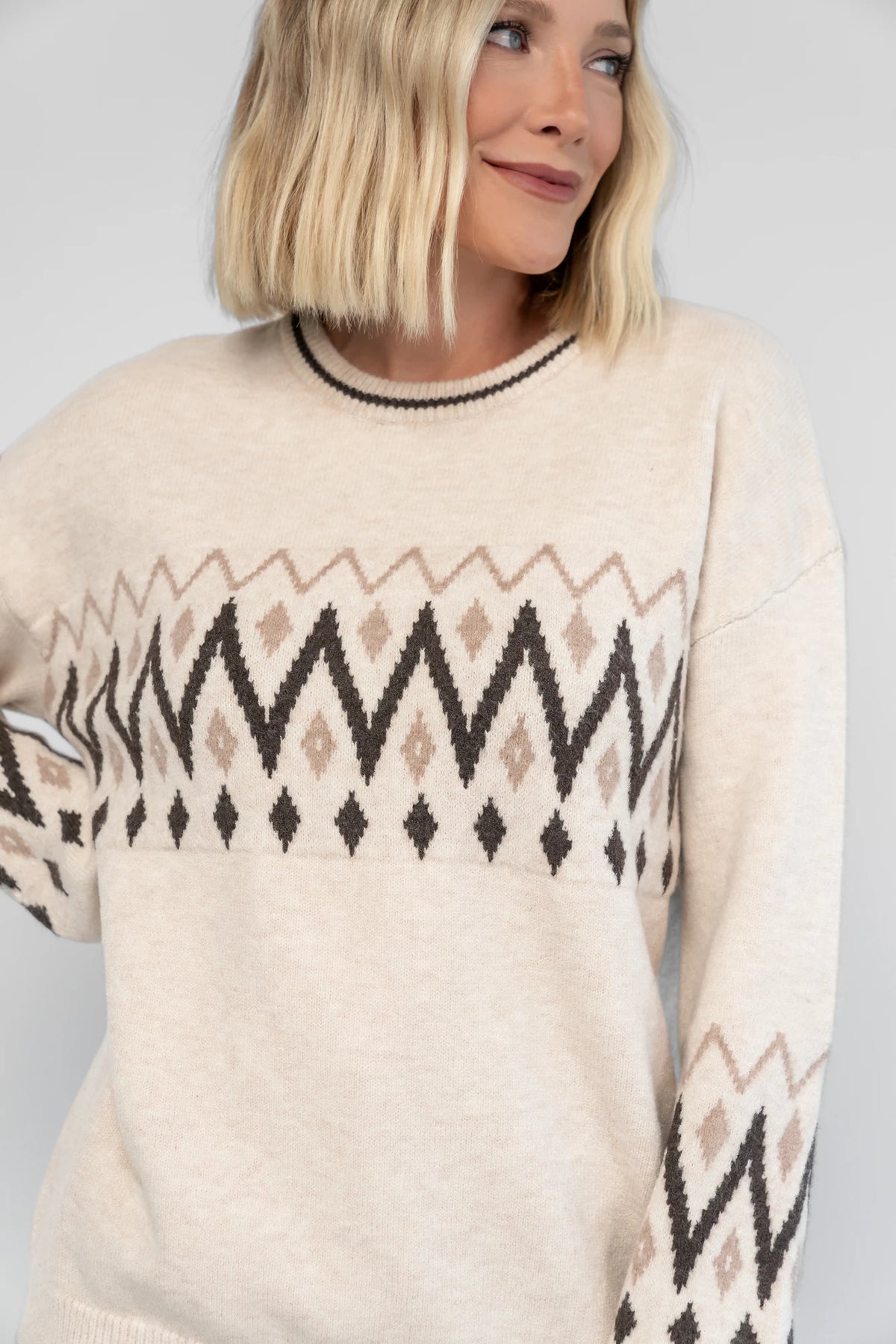 Oona Sweater in Natural with a buttery-soft knit, Fair Isle print, round neckline, and relaxed dropped-shoulder fit.