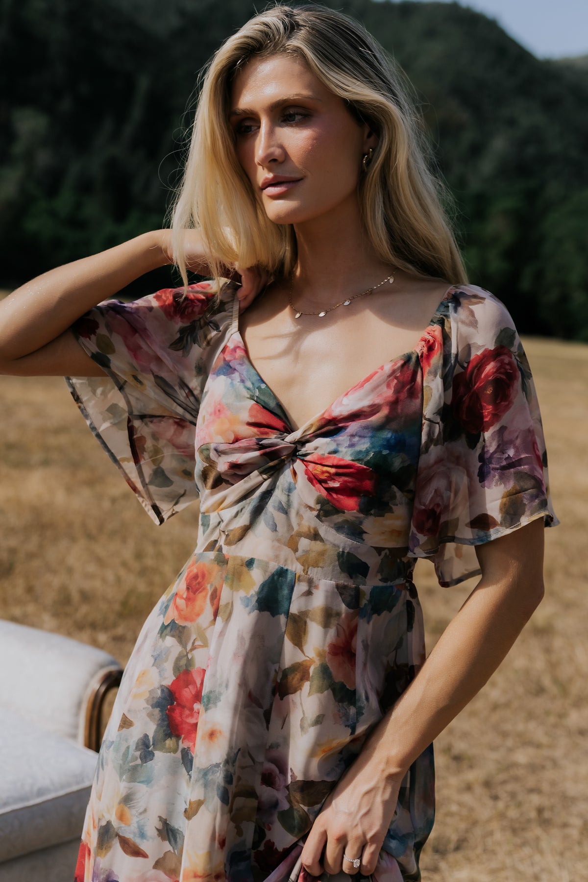 Positano Maxi Dress in Rose Multi Floral with sweetheart knot neckline and flutter sleeves.