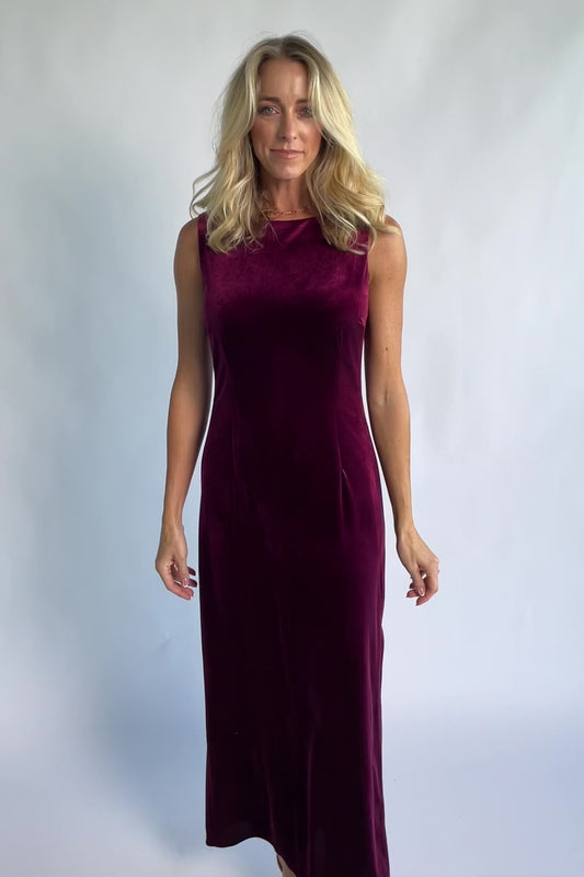 Charley Velvet Maxi Dress in Wine with an elegant boat neckline, sleeveless design, and a figure-skimming column silhouette.