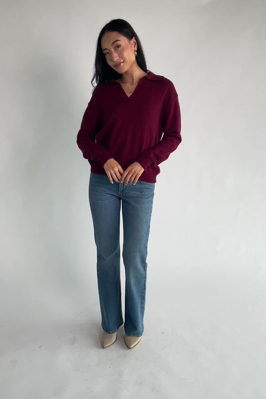 Bodhi Sweater with open rugby-style collar, dropped shoulders, long sleeves, and ribbed cuffs and hem.