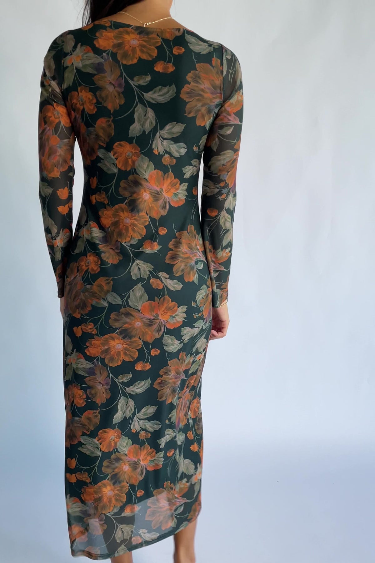 Miley Mesh Dress in Topaz Floral with round neckline, long sleeves, soft mesh fabric, and fitted silhouette.