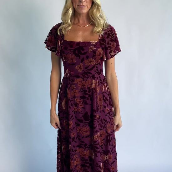 Clio Maxi Dress in Mulberry + Gold Floral with square neckline, flutter sleeves, and empire waist.