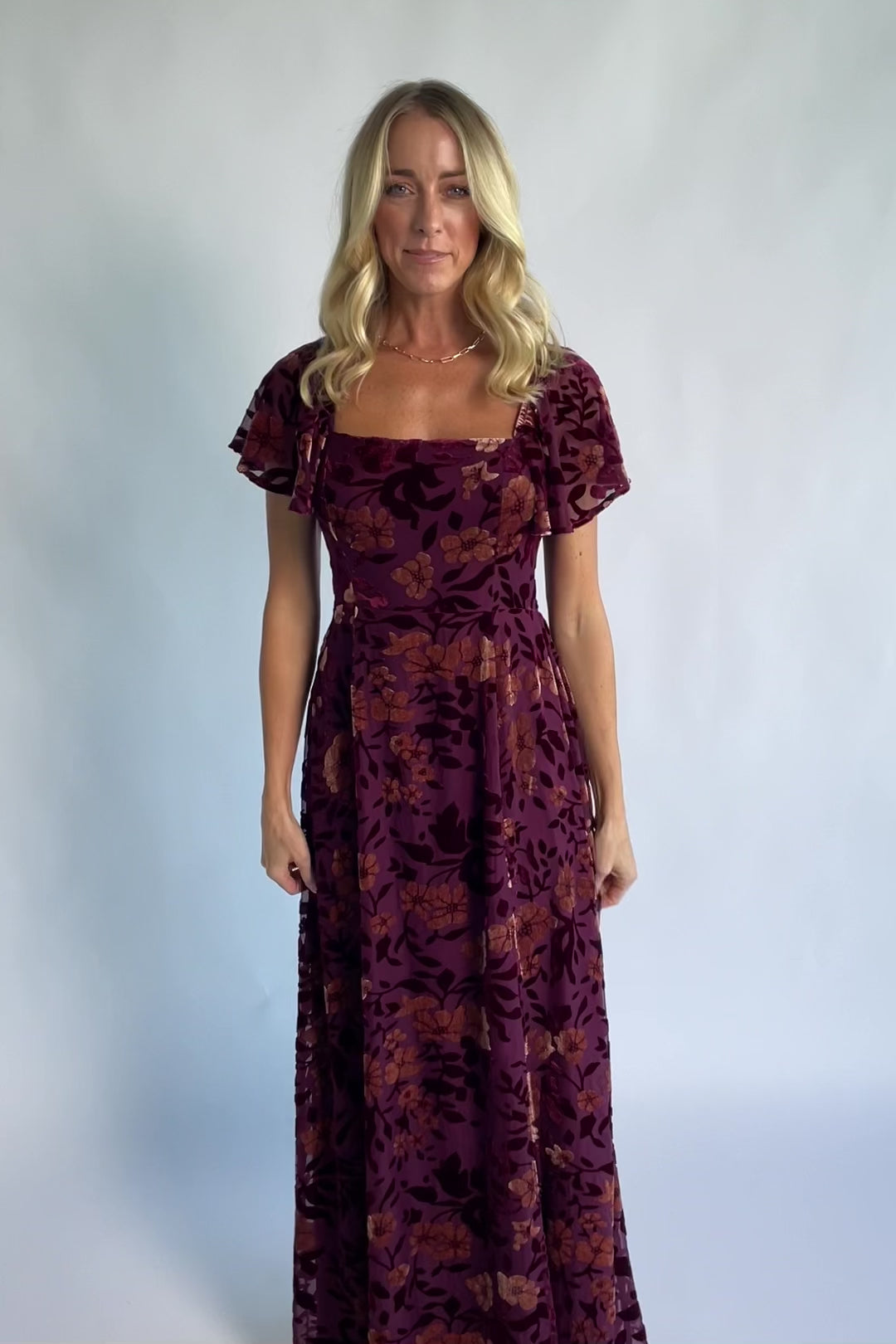 Clio Maxi Dress in Mulberry + Gold Floral with square neckline, flutter sleeves, and empire waist.