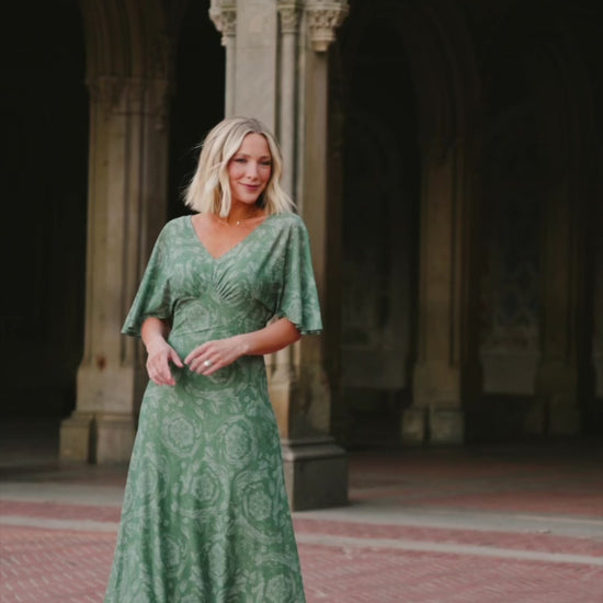 Dark sage mesh maxi dress with a floral mesh overlay, V-neckline, short dolman sleeves, empire waist, and removable ribbed tank slip.