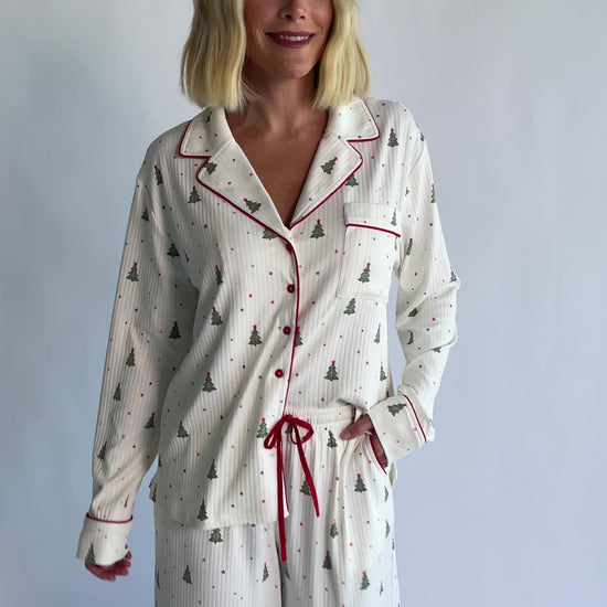 Holiday Cozy Rib Knit Pajamas in Ivory + Evergreen with an evergreen tree print, button-front top, and contrast red piping.