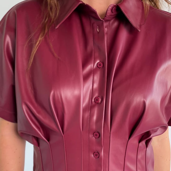 Montclair Structured Midi Shirt Dress in Burgundy with faux leather, button front, pleated waist, and full skirt.