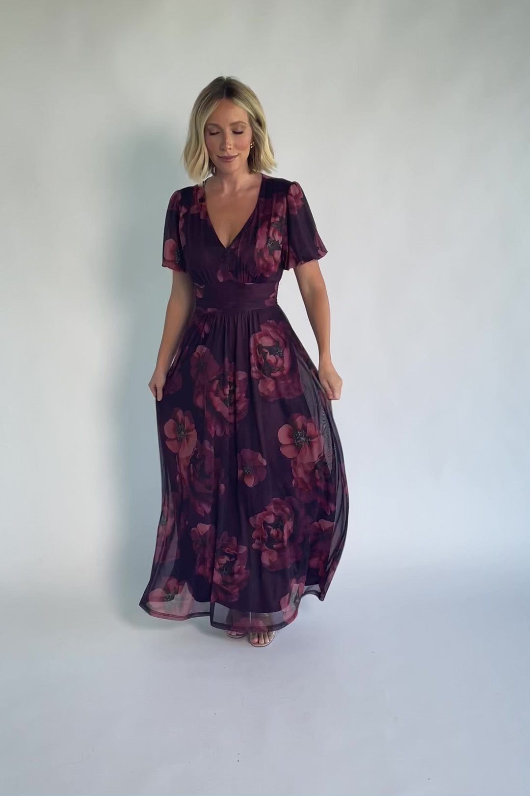 Whitney Mesh Maxi Dress in Deep Berry Floral with deep V-neck, short sleeves, empire waist, and flowing skirt.