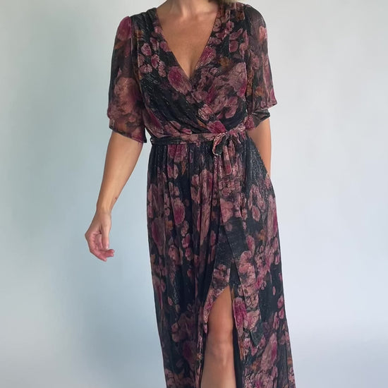 Rachel Maxi Dress in Black + Pink with shimmer florals, surplice neckline, self-tie sash, and leg slit.