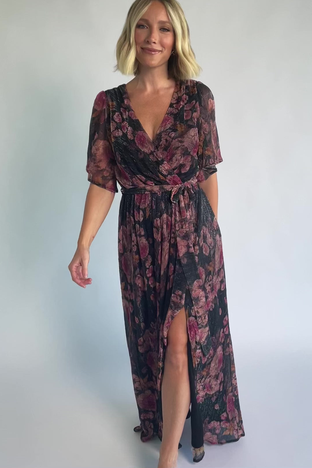 Rachel Maxi Dress in Black + Pink with shimmer florals, surplice neckline, self-tie sash, and leg slit.