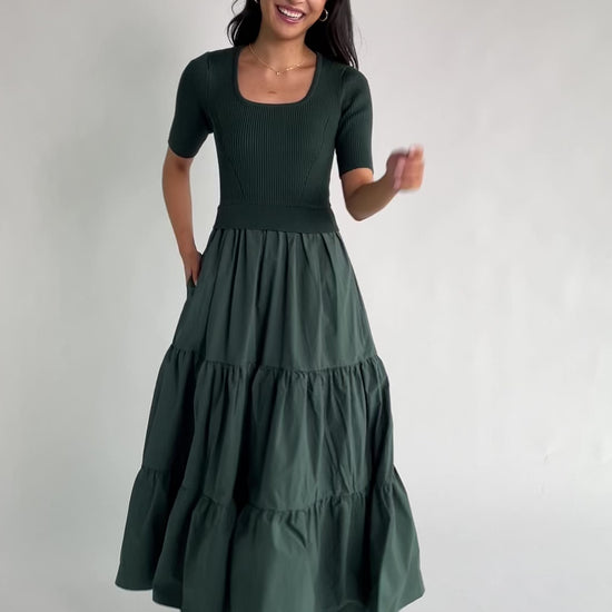 Astra Tiered Dress in Winter Green with ribbed knit bodice, scoop neckline, short sleeves, and tiered cotton skirt.