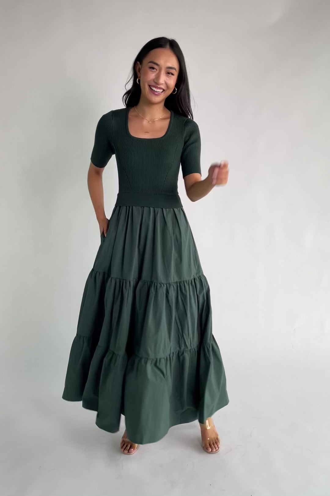 Astra Tiered Dress in Winter Green with ribbed knit bodice, scoop neckline, short sleeves, and tiered cotton skirt.