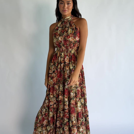 Pulitzer Maxi Dress in Rose Multi with a high halter neckline, textured chiffon, smocked waistband, and tiered maxi skirt.