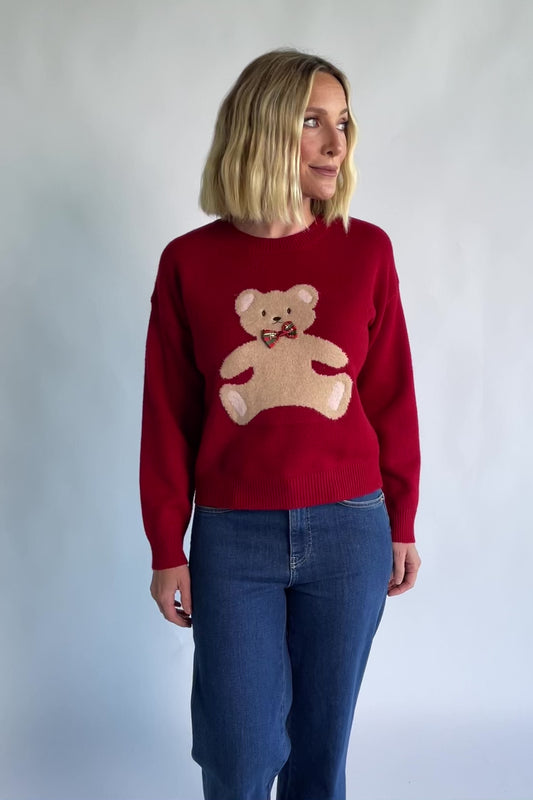 Jaxton Sweater in Red with a round neckline, ribbed trim, and a teddy bear graphic with a bow tie.