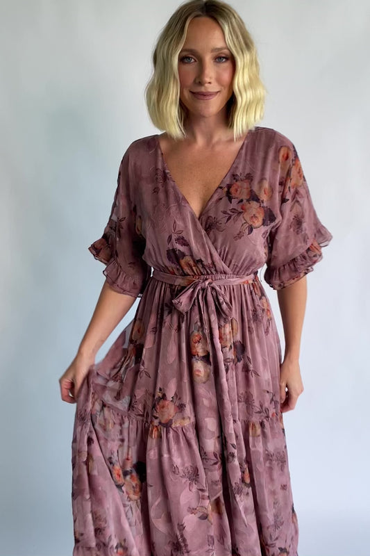 Cora Maxi Dress in Vintage Mauve Floral with V-neckline, flutter sleeves, and tiered maxi skirt.