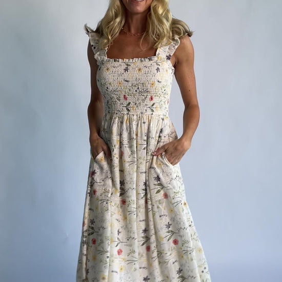 Tulia Lace Midi Dress in Cream Floral with square neckline, smocked bodice, and ruffle straps.