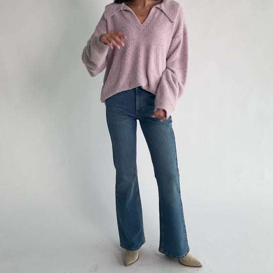 Lockwood Sweater in Dusty Lilac with fuzzy knit texture, collared V-neck, long sleeves, and ribbed cuffs and hem.